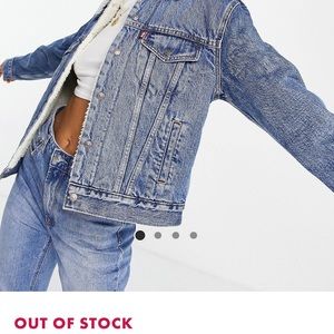 Levis  sherpa denim trucker jacket in mid wash blue
